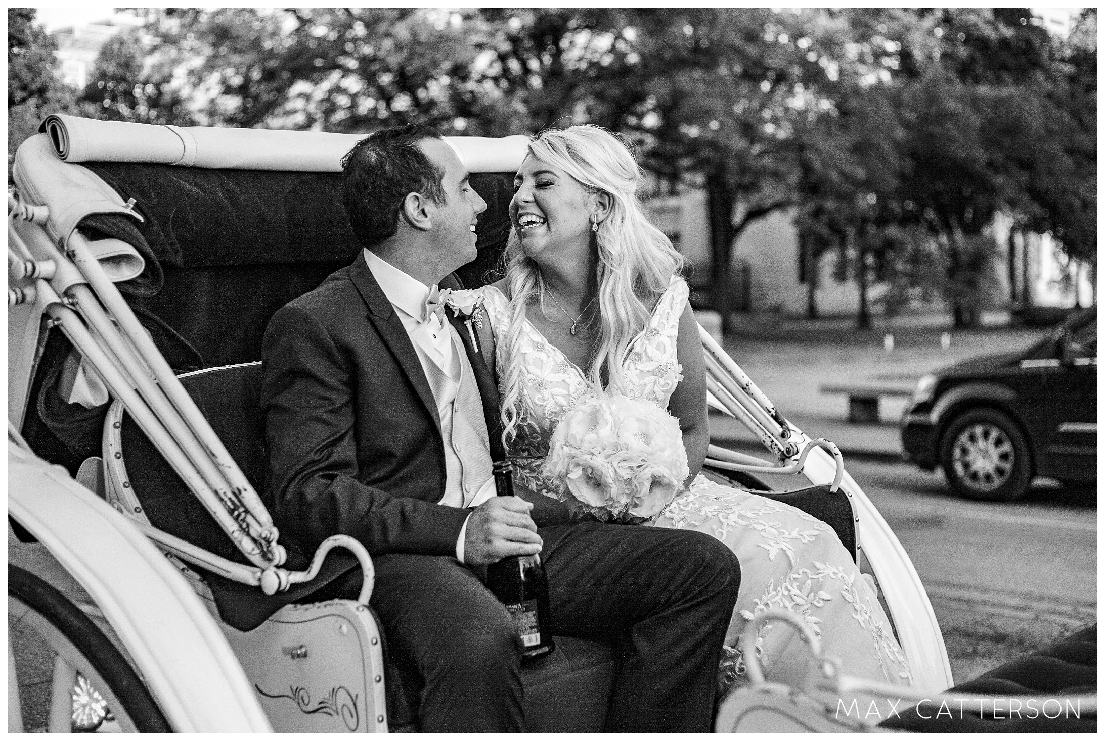 bride and groom in horse carriage